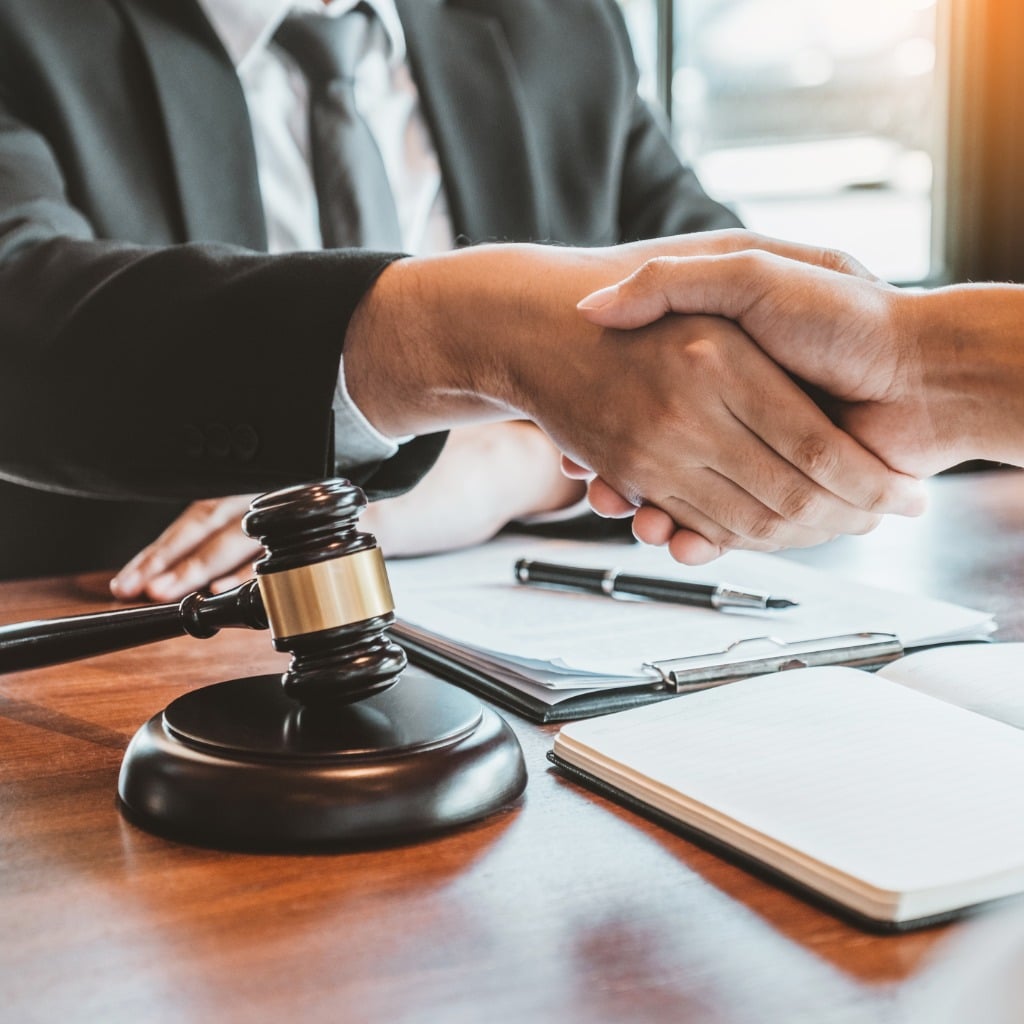 businessman shaking hands to seal a deal judges male lawyers legal